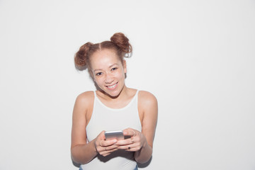Portrait smiling, confident young woman texting with smart phone