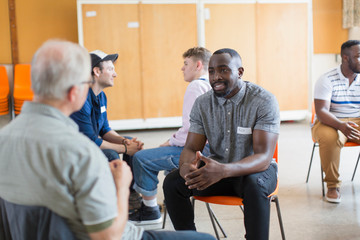 men talking in community center