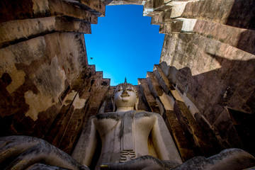 Background Unseen tourist attractions in Thailand (Big Buddha statue in Wat Si Chum) in Sukhothai province, tourists always come to see the beauty.