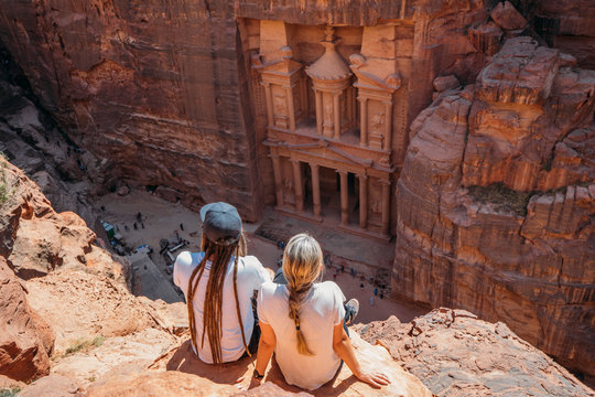 Couple enjoying architectural ruins, Petra, Jordan