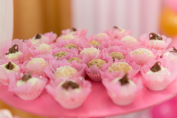 Trays with many anniversary sweets typical of Brazil.