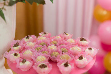 Trays with many anniversary sweets typical of Brazil.