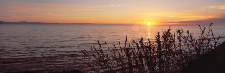 Fototapeta na wymiar Sunset over Pacific Ocean near Santa Barbara, California