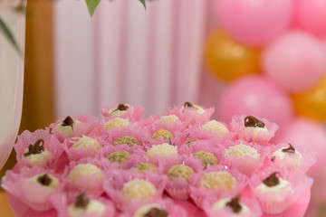 Trays with many anniversary sweets typical of Brazil.