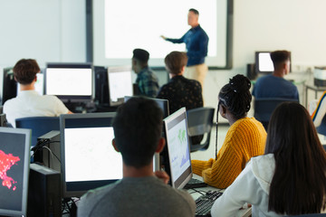 Junior high students at computers in classroom