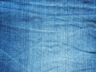 Close up blue denim textile background.