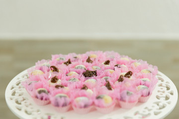 Trays with many anniversary sweets typical of Brazil.