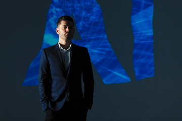 Double exposure businessman and AI text