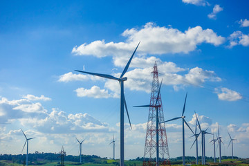 Fototapeta premium Wind turbine with blue sky. Wind energy. Clean energy