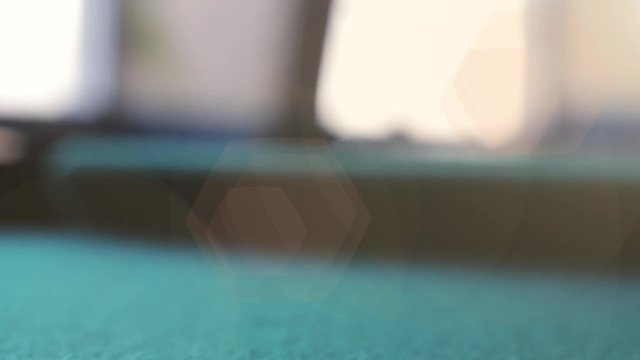 Pool player shoot White Ball on a Green Pool Table. 