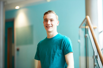 Portrait confident young male college student