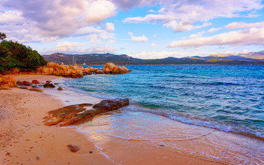 Landscape with Romantic morning at Capriccioli Beach in of the Mediterranean sea on Sardinia island...