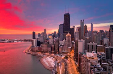 Rolgordijnen Chicago red sunrise aerial view of Gold Coast © Ionel