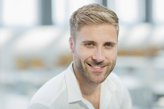 Close up portrait smiling businessman