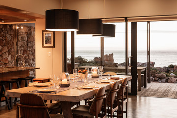 Home showcase dining room overlooking ocean