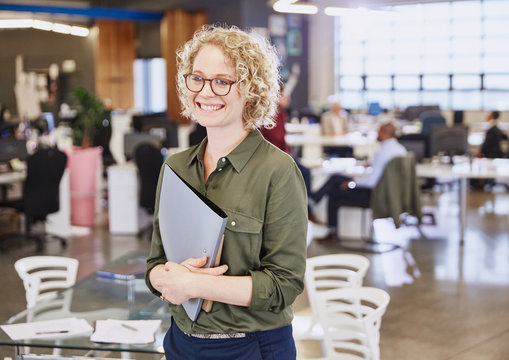 Smiling businesswoman in office