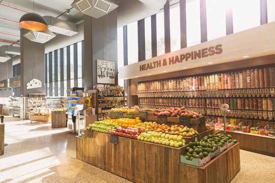 Produce and bulk food on display in health food grocery store market