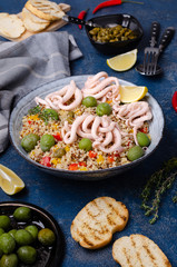 Quinoa with vegetables and squid tentacles