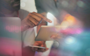 Close up business people using digital tablet