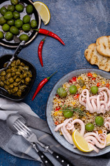 Quinoa with vegetables and squid tentacles