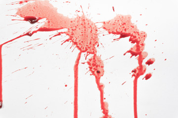 Blood spattered on a white background