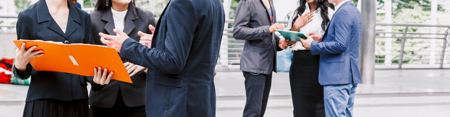 Successful group of business people discussing and working with document report.creative business people planning and brainstorm in modern city.Teamwork concept