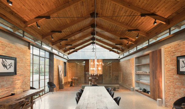 Home showcase interior with vaulted wood ceiling