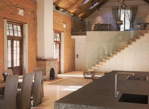 Home showcase interior living space with brick wall and loft