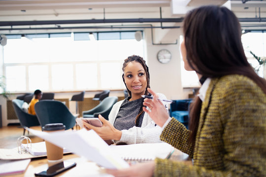 Businesswomen talking in meeting
