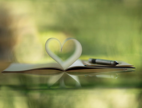 Notebook pages forming heart shape
