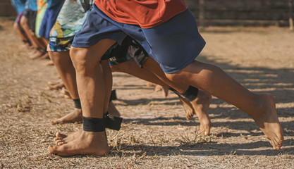 Fototapeta premium Close-up The 31 leg competition, the leg that is moving at the same time,Teamwork. Unity.