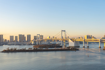 Fototapeta na wymiar Tokyo skyline with view of Rainbow bridge in Japan