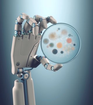 Robotic hand holding a petri dish