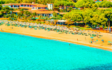 Fototapeta na wymiar Beautiful nature of Villasimius and with Blue Waters of the Mediterranean Sea on Sardinia Island in Italy in summer. Cagliari province. Landscape and scenery
