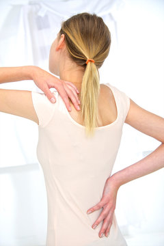 Woman with back ache
