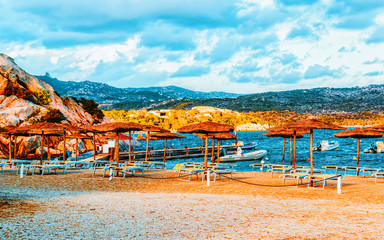 Landscape with Romantic morning at Capriccioli Beach in of the Mediterranean sea on Sardinia island...