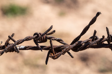 Old barbed wire that has been used to rust