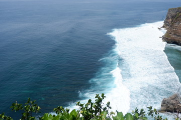 waves crashing on rocks