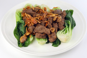 Soy ginger beef on bed of blanched bok choy