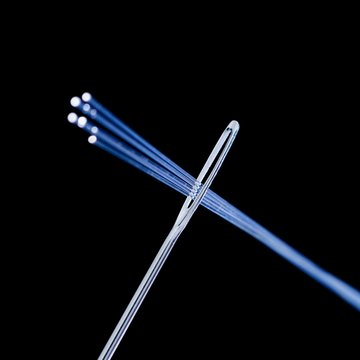 Fibre optics and needle