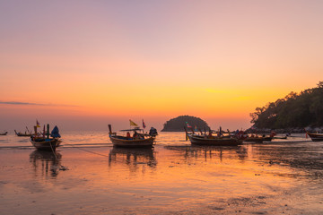 Fototapeta na wymiar fishing boats in sunset at Kata beach Phuket Thailand