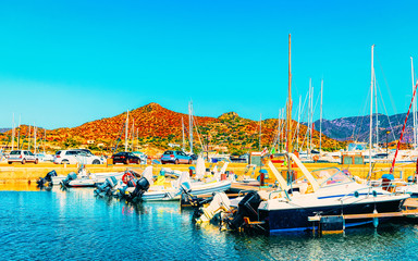 Old Sardinian Port and marina with ships at Mediterranean Sea in city of Villasimius in South...