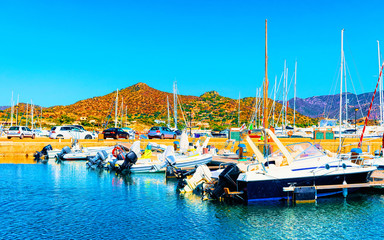 Old Sardinian Port and marina with ships at Mediterranean Sea in city of Villasimius in South...