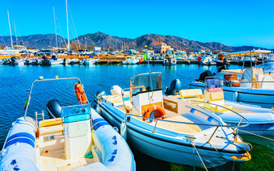 Old Sardinian Port and marina with ships at Mediterranean Sea in city of Villasimius in South...