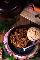 Polish bigos with sausage and dried plum