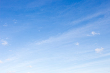 Bright blue sky with white clouds for background or wallpapers