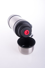 Thermo or Thermo flask from stainless steel on background new.