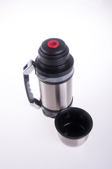 Thermo or Thermo flask from stainless steel on background new.