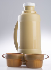 Thermo or Plastic Thermos flask on background new.