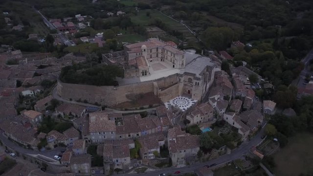 Aerial famous Grignan palace and church in provence at sunrise france